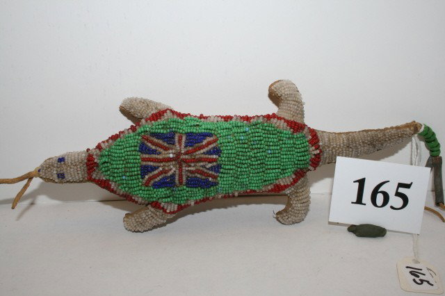 Plains Lizard Beaded Fetish: 9" Northern Plains Lizard Beaded Fetish with British Flag and Tin Cone Decoration – nice