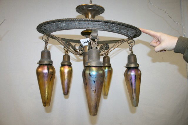 Brass Chandelier with 5 "Loetz" Style Bullets: 5 Scrolled Drop Brass Chandelier with 5 Green, Gold, and Purple Unsigned Iridescent "Loetz" Style Bullets 18" Tall x 20 1/2" Dia.