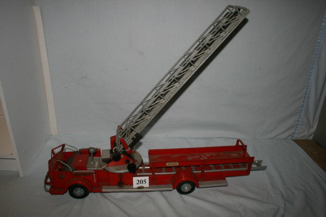 Aerial Ladder Truck: Aerial Ladder Truck by "Model Toy" American LaFrance ALFCO Rossmoyne Charles WM. Doepke Mfg Co. Rossmoyne, Ohio 28" long (minor paint loss and rust)