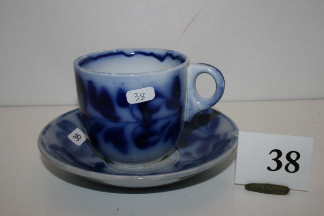 Flow Blue Cup & Saucer: Three Petals & Leaves Flow Blue Cup & Saucer by Meakin