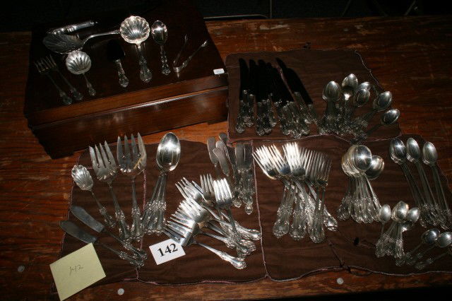 125 Pc. Set of Sterling Silver: 125 Pc. Set of Sterling Silver (Wild Rose) – 12 Dinner Knives, 12 Forks, 12 Cream Spoons, 12 salad forks, 12 demitasse spoons, 12 ice tea spoons, 12 butter knives, 24 teaspoons, 2 butter knives, sug