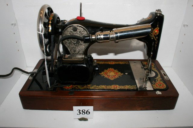 Singer Sewing Machine: Electric Singer Sewing Machine in original case – nickel & painted décor