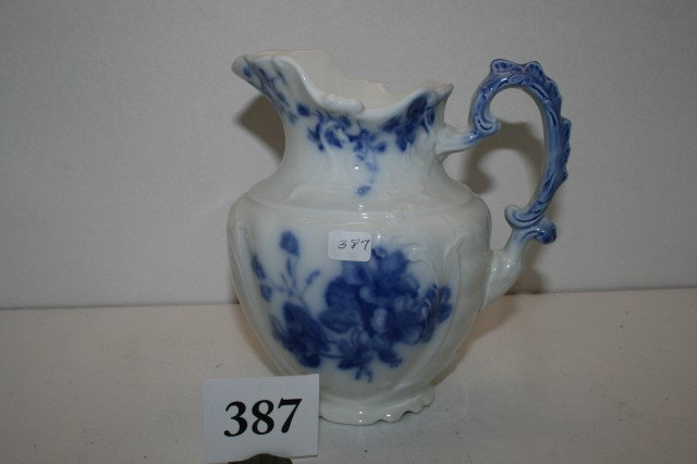 Flow Blue Manhattan Pitcher: 7" Flow Blue Manhattan Pitcher – crown mark on bottom