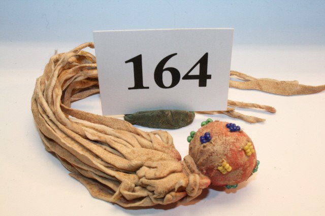 Rawhide Fetish: 7" long Rawhide Fetish with bead decorated ball shaped head – old, unusual