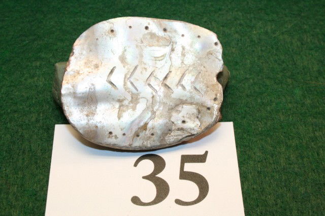 Punctated Shale Pendant: 1 ½” x 1 ¾” Abalone Engraved and Punctated Shale Pendant with broken suspension hole