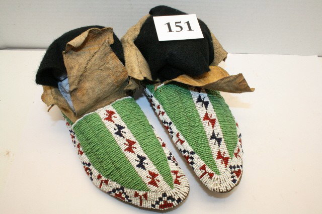 Pair of Cheyenne Beaded Moccasins: 10” Pair of Cheyenne Beaded Moccasins – rawhide soles, sinew beaded, very nice!