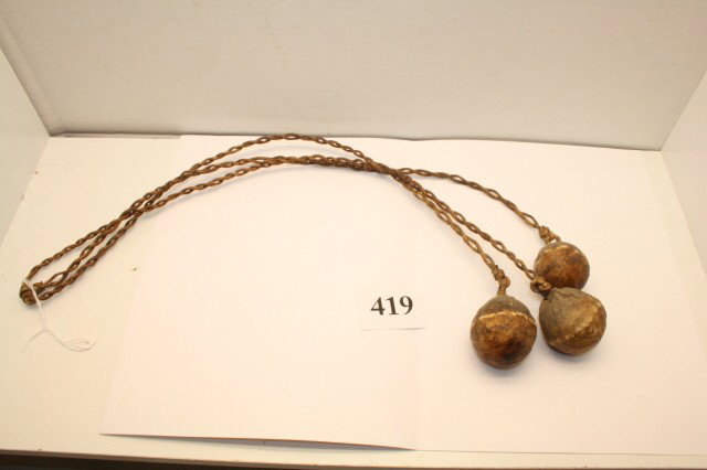 Rawhide Wrapped Stone Bolos: 24” Rawhide Wrapped Stone Bolos – twisted rawhide thongs, very good condition