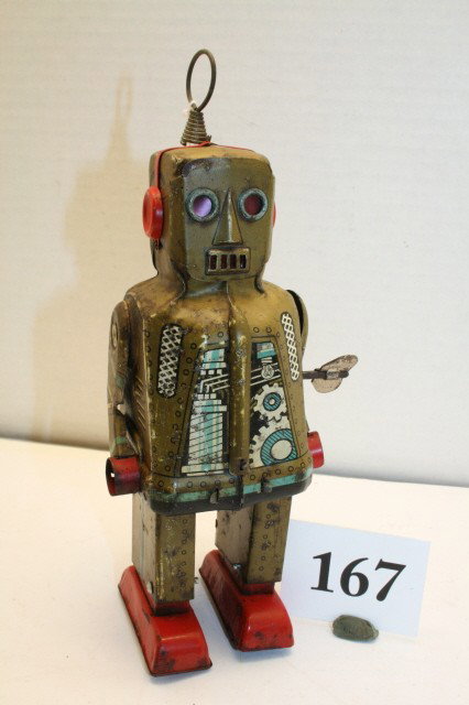 Wind up Walking Robot: Wind up 7 ¾” Walking Robot – discoloration to finish – working (G)