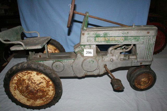 John Deere SM. 60 Pedal Tractor: John Deere SM. 60 Pedal Tractor 1952, seat back (G) seat bracket and steering wheel guide frame broken