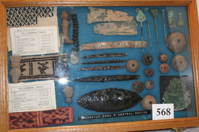 Mayan Artifacts: 12 x 18 Frame with Mayan Artifacts Coahuila Region Central Mexico – consists of 10 Pottery Beads, 4 drills, obsidian blade, one silver leaf band, several copper items, textiles, several stone beads