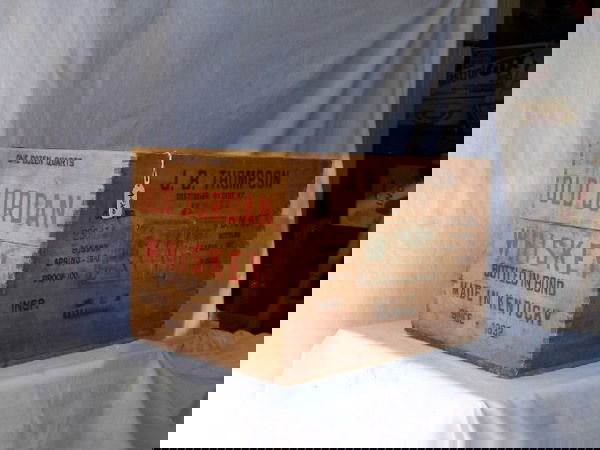 Shipping Crate: Shipping Crate - Old Jordan Whiskey, Bottled in Bond, Made in Kentucky Since 1832, Bonded Spring 1910, Bottled Feb. 1917 Tax stamp, J.B. Thompson Distiller, 8th Dist Ky. One Dozen Quarts - 17"x 12.5"x