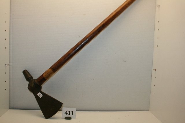 Brass Pipe Tomahawk Head: 27” Overall Length, 8 ½” Brass Pipe Tomahawk Head – old tag illegible, stem file marked comes with informational letter pertaining to the sale of this item at Sotheby’s Auction 9-25-90 and at