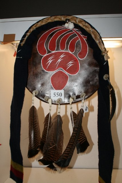 Hide Paint Decorative Hide Shield: 13 ½” Circular Hide Paint Decorative Hide Shield with Turkey feathers made by Greg Red Elk (contemporary)