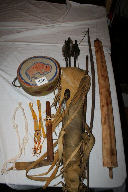 Leather Quiver, Bow: Lot consisting of Leather Quiver, Bow and 3 pointless arrows and a 8” x 4” painted circular dance drum and a wood pipe stem