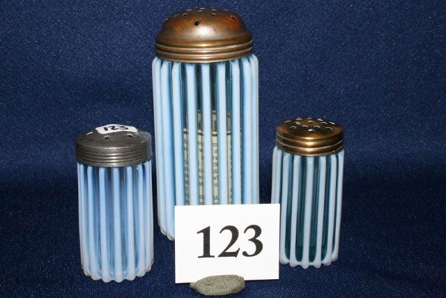 4 Pcs. Opal & Blue Ribbed Salt: 4 Pcs. Opal & Blue Ribbed Salt, Pepper, Sugar Shaker & Toothpick holder – one shaker (chip on rim) largest 4 ¾” tag inside reads Tiffin Glass 1889 A.J. Beatty