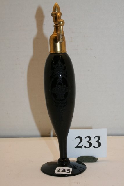 Black Glass Perfume Bottle: 7 ¾” Tall Black Glass Perfume Bottle – missing bulb, etched basket on bottle