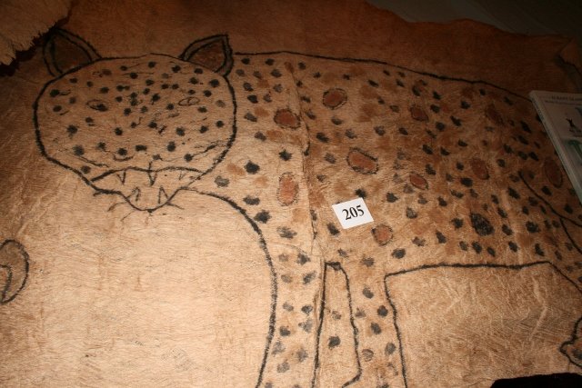 Bark Painting: 29” x 52” Bark Painting – Amazon Jungle, portraying a spotted cat and a bird – nicely done!
