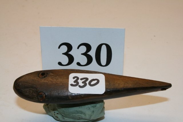 Fossilized Ivory Whale Sinker: 3 ¼” Fossilized Ivory Whale Sinker Inset Eyes Perforated for attachment, Inuit