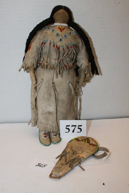 10” Northern Plains Doll: 10” Northern Plains Doll – deer skin with seed beads and cradle board, circa 1900