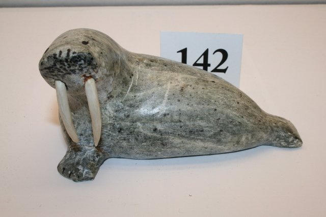 Soapstone Walrus: 5 ¼” Soapstone Walrus with ivory tusks – initialed Collected by Joe Lewis in 1960