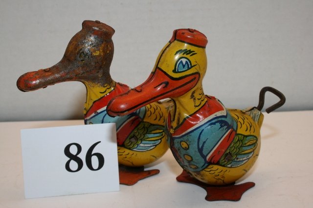 2 Early J. Chein Wind Up Donald Duck Toys: 2 Early 3 5/8” J. Chein Wind Up Donald Duck Toys – 1 rusted and 1 slightly rusted – both work