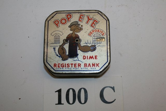 Popeye Dime Register Bank: 2 ½” Popeye Dime Register Bank – Copr. King Feat. Synd. 1929 – Unlocks @ $5.00 – some wear – overall good shape