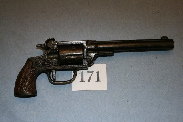 “Lasso ‘Em Bill” Cap Gun: 9 ½” Cast Iron “Lasso ‘Em Bill” Cap Gun – excellent shape – painted handle – Pat. Sept. 11 1923