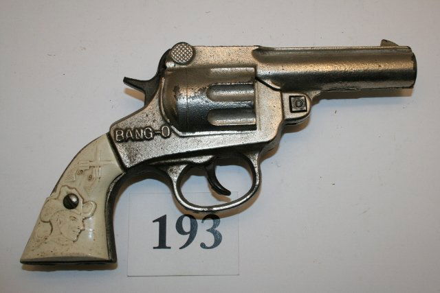 Cast Iron “Bang – O” by Stevens: 7 ¾” Nickel Plated Cast Iron “Bang – O” by Stevens – sliver of plastic handle missing – slightly rusted