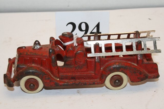 Cast Iron Ladder Fire Truck No. 2231: 5” Hubley Cast Iron Ladder Fire Truck No. 2231 – circa 1938 – 2 new ladders – worn paint – rubber tires