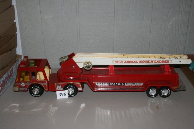 Fire Dept. Engine Co. #5 Pumper/Ladder Truck: 31 ¼” Metal Fire Dept. Engine Co. #5 Pumper/Ladder Truck by Nylint – missing 2 extra ladders – one plastic ladder mount broken off – few paint chips – average shape