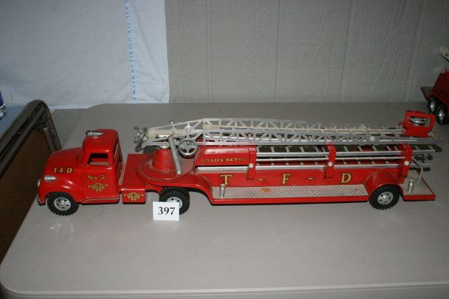 Fire Dept. Ladder No. 5 “Life Net” Truck: 31 ¼” Great Metal Tonka Toy Fire Dept. Ladder No. 5 “Life Net” Truck – Great Decals – few paint chips – missing hand crank on steering wheel driving trailer bed – excellent condition