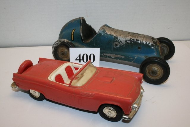 2 Toy Vehicles: 2 Toy Vehicles – 8 ½” Blue Die Cast Race Car by Thimble Drome Special with rough paint – 7 ¼” Mechanical Plastic Convertible Thunderbird with metal frame – both rough shape