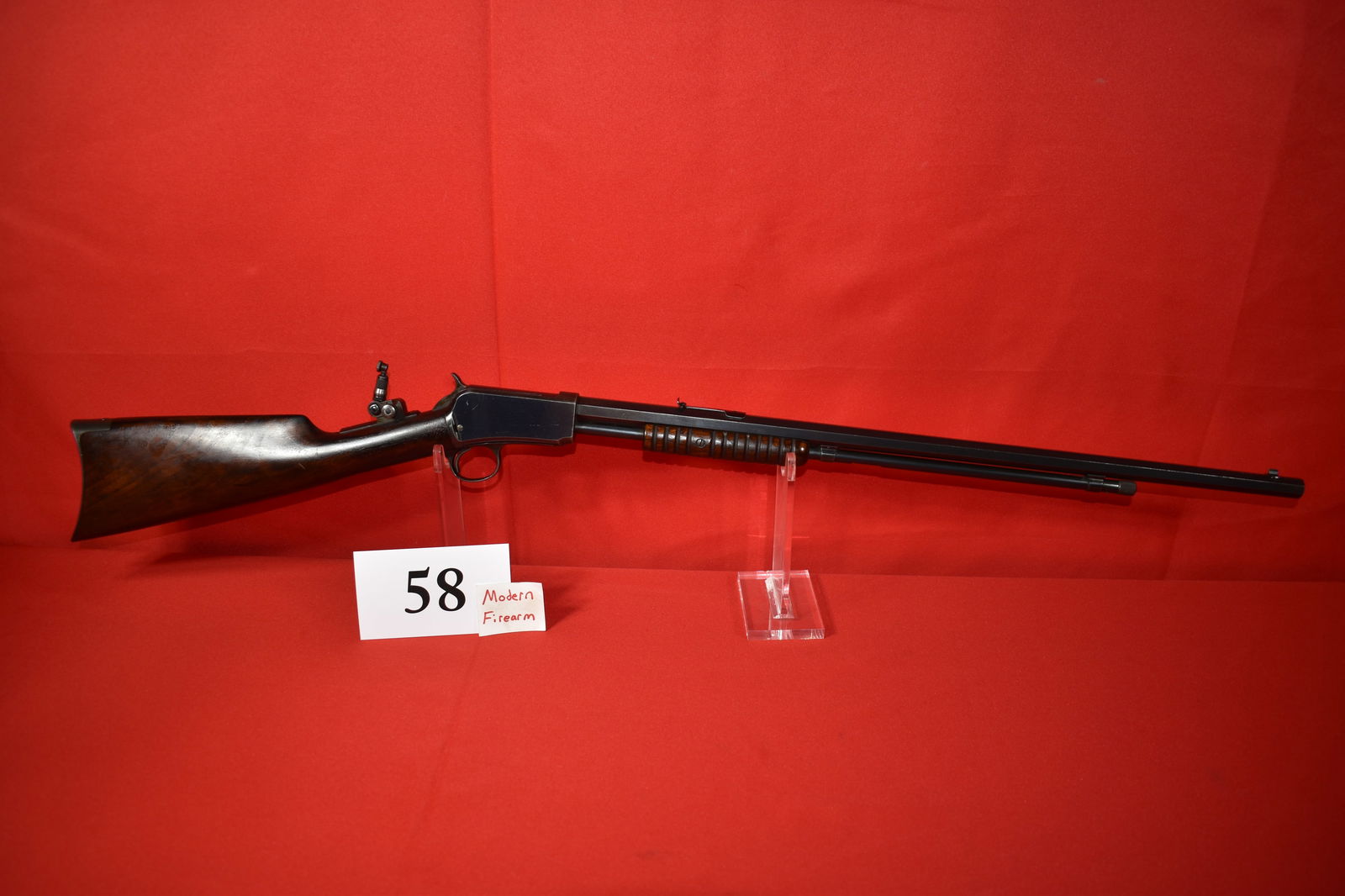 (X) Winchester Model 1890 “90” .22 long Slide Action Rifle: (X) Winchester Model 1890 “90” .22 long Slide Action Rifle, SN# 168766 mfg. 1903, 24” oct. bbl. Lyman Tang Sight, very good Condition