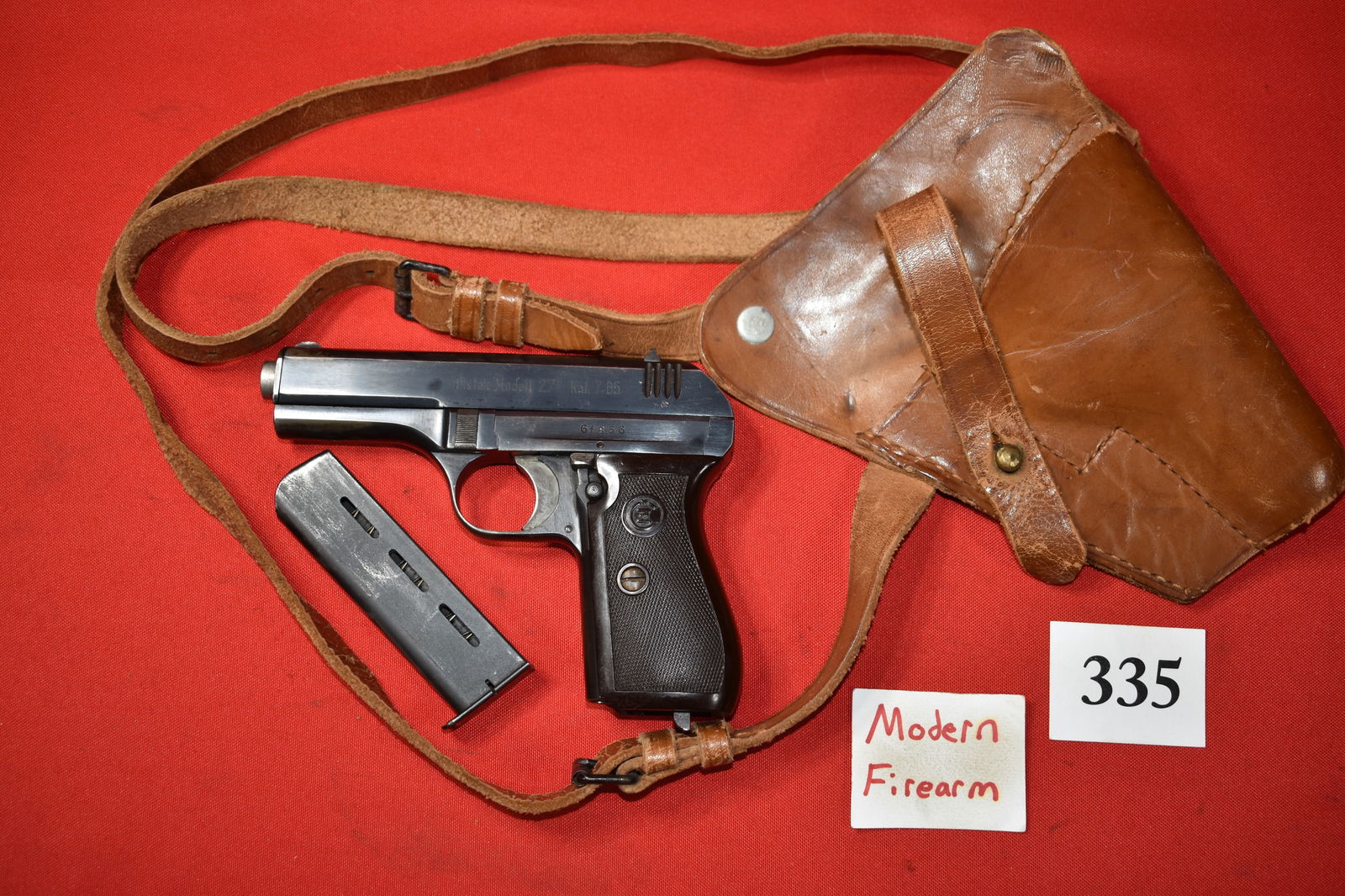 (X) CZ Model 27 7.65/.32 acp pistol: (X) CZ Model 27 7.65/.32 acp pistol, SN# 61856 matching, German Wehrmacht proofs, 1942 mfg. has a Model 24 .380 acp magazine, leather shoulder holster rig, non-import, vet bring back, very good condit