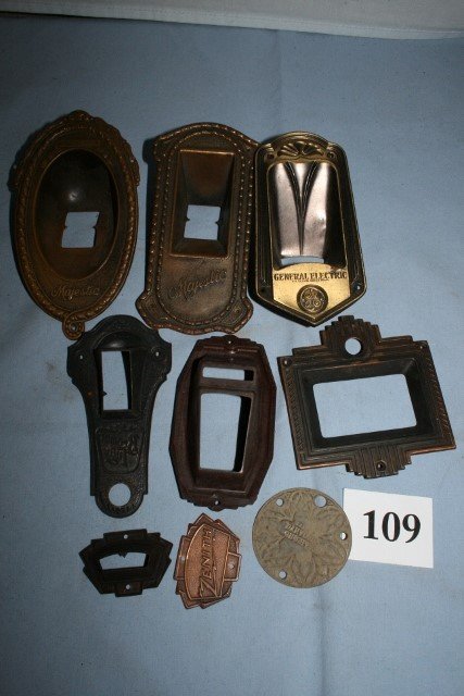 10 Radio escutcheons and medallons: 10 Radio escutcheons and medallons, 3 Majestic,ge,Bremer Tully, 5 misc.