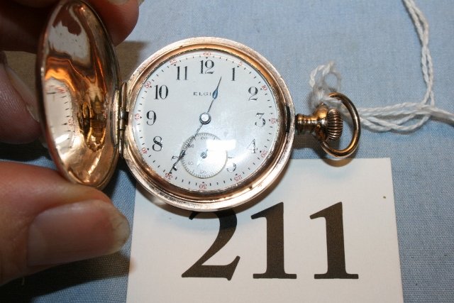 Size 0, Elgin, S/N 17835161: Size 0, Elgin, S/N 17835161, side winder,25 yr. hunter case,case has two flashes of 10K gold,chip on face,Wadsworth pilot case, . Front and back engraved, runs - circa 1913-14