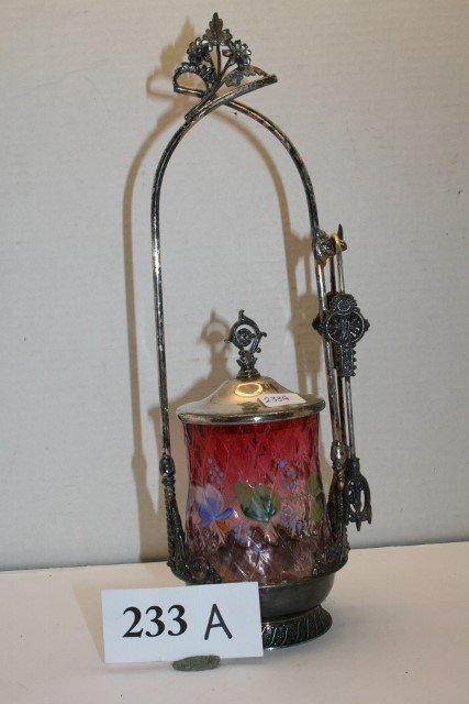 cranberry to clear pickle caster: Very nice cranberry to clear pickle caster with hand painted flowers. James M. Tuffs, Boston silver plated No. 3613 holder, fancy tongs, insert is 3 1/4" x 4" deep, holder is 13 1/2" tall - the clear 