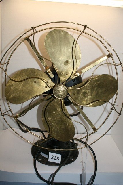 EMERSON brass bladed fan: Large EMERSON brass bladed fan, works on high only, rotates. 17" dia fan gage, 21" high