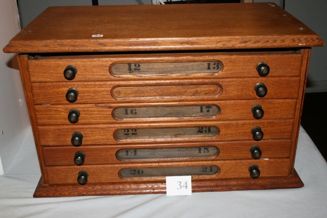 6 Drawer Spool Cabinet: 22” L x 12” W x 12” High 6 Drawer Spool Cabinet – Oak, needs some repair work done