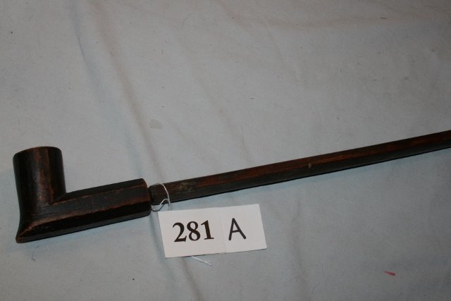 4” Wood Elbow Pipe: 4” Wood Elbow Pipe with metal bowl insert – 2 holes drilled in top where an effigy may have been attached, 26 ½” old original patinated wood stem – great old artifact, Rosebud Reservation –