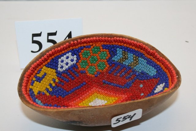 Gourd: 4 1/8” x 2 ¼” Gourd with interior designed beadwork lining