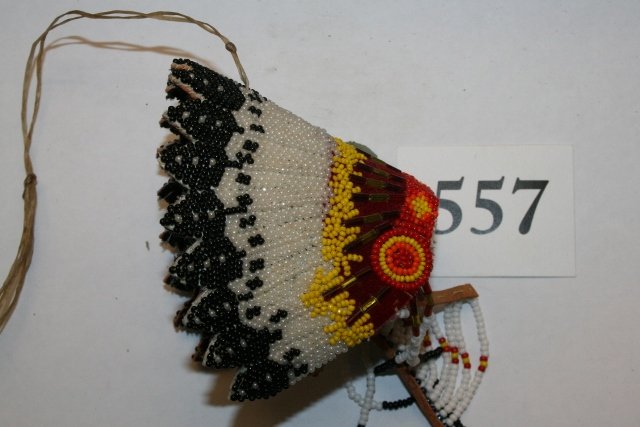 Miniature Indian Chief Headdress: 3 ½” x 6” Miniature Indian Chief Headdress, leather with colorful beadwork decorations, with bead drops, finely made Folk Art Object, contemporary