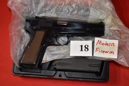 (X) Browning Hi-Power 9mm Pistol