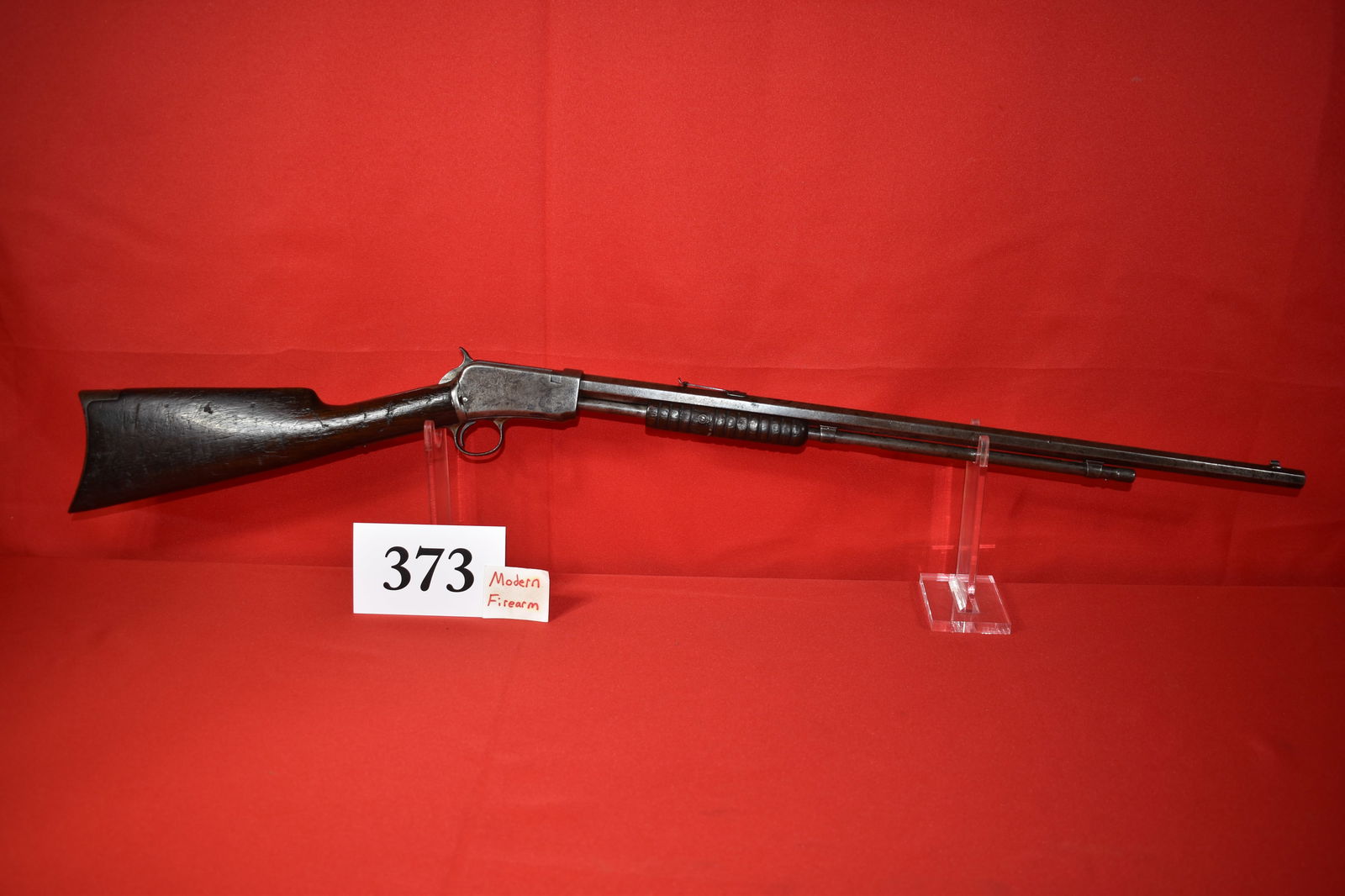 (X) Winchester Model 1890 .22 Long Slide Action Rifle: (X) Winchester Model 1890 .22 Long Slide Action Rifle, SN# 323536 mfg. 1907, 24” oct. bbl., worn patina, great function, takedown