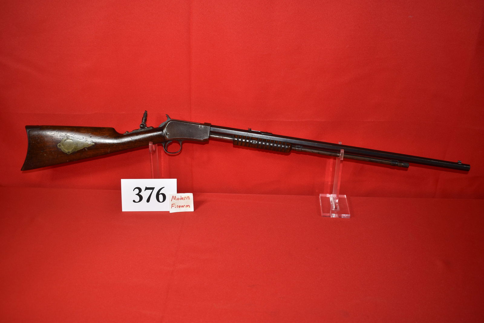(X) Winchester Model 1890 .22 Short Slide Action Rifle: (X) Winchester Model 1890 .22 Short Slide Action Rifle, SN# 554694, mfg. 1915, 24” oct. bbl., tang sight on brass plate, cap box in butt stock, great function, takedown