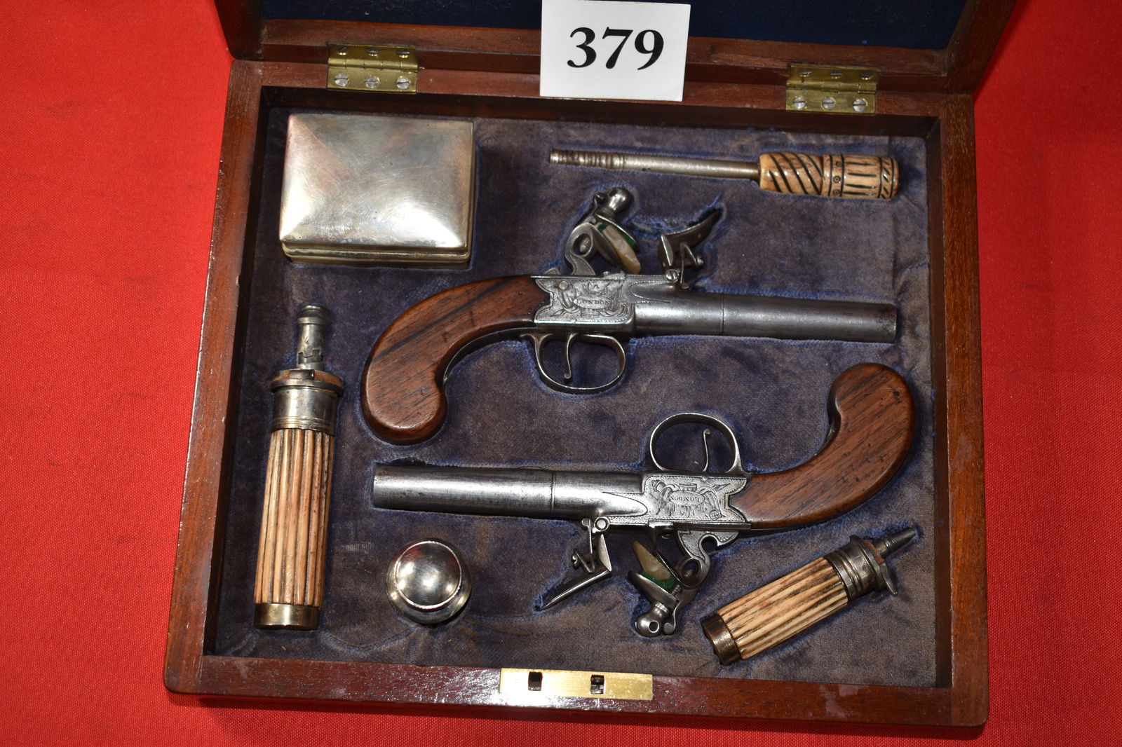 Cased Coach Flintlock Pistols: Cased Coach Flintlock Pistols, Bunney London with accutrements, Hawksley Powder Flask, Bone Carved accessories, great function in wood case “Set of Dueling Pistols”