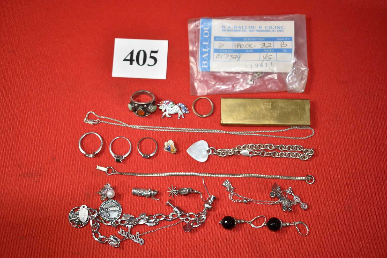 99 grams of Sterling Silver Vintage Jewelry *EDITED DESCRIPTION*: 99 grams of Sterling Silver Vintage Jewelry, 14K marked ring (HOWEVER IT WAS TESTED AND IS NOT GOLD) , BRASS bar weighing 165 Grams, Opal, Turquoise