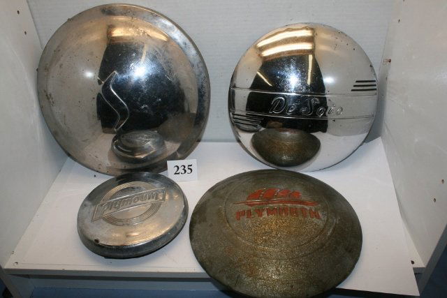 Box of hub caps: Box of hub caps: 10” Desoto, 6 ½” Plymouth, 11” Studebaker and 10 “Plymouth.