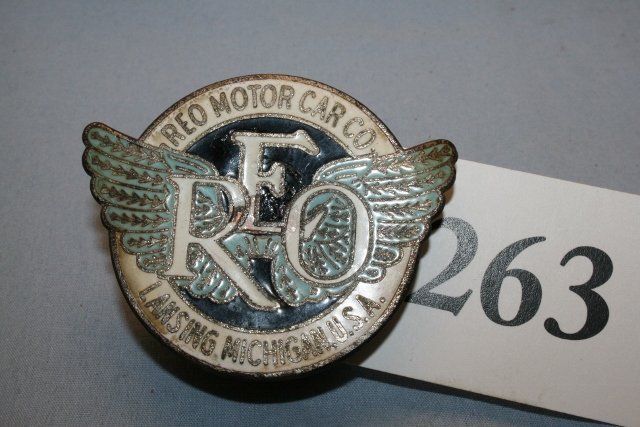 REO Motor Car Co auto emblem: REO Motor Car Co. enameled auto emblem
