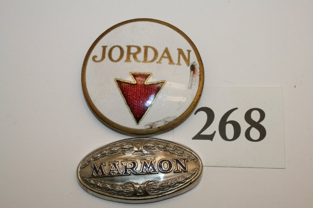 Two enameled auto emblems: Two enameled auto emblems: Marmon, Jordan, all missing enamel. 2 ½”
